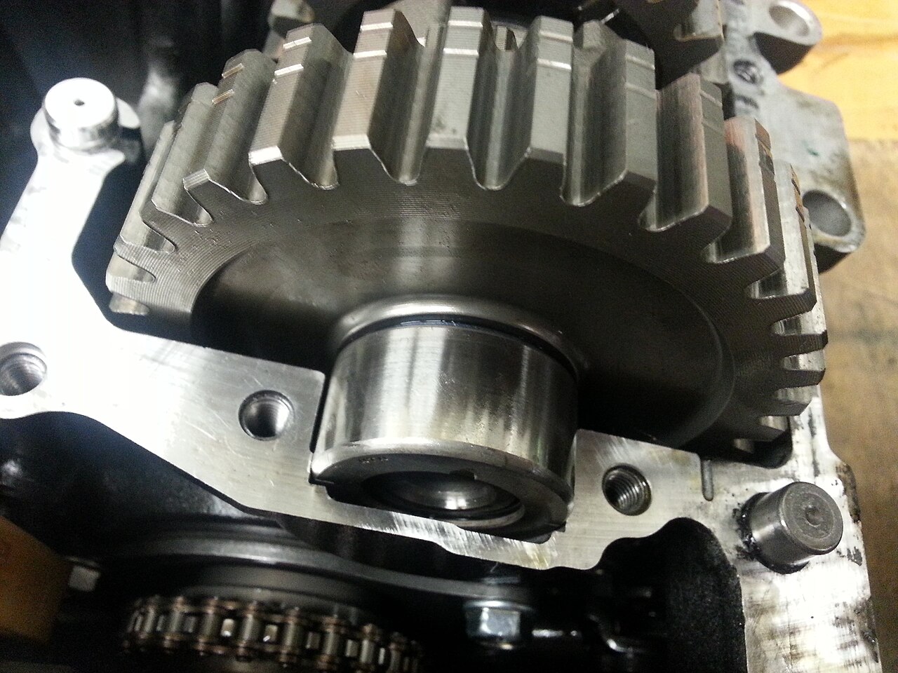Transmission gear with a needle roller bearing in its bore during a gearbox teardown